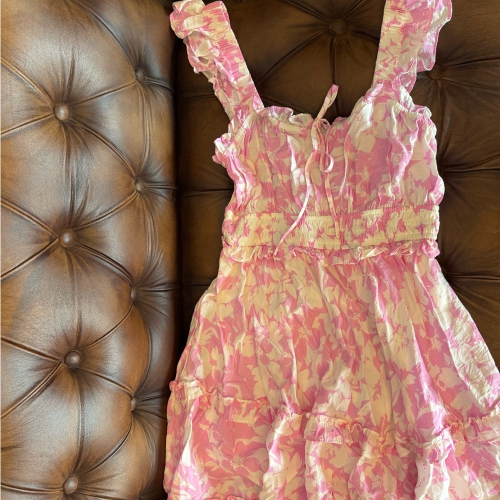 Blu Pepper Pink and White Ruffle dress. Above knee
